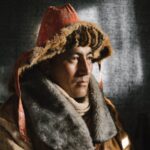 man in brown and white fur coat
