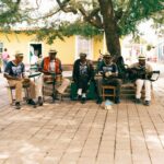 group of cubans playing music in public square trinidad cuba
