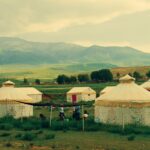 mongolian tents on meadow